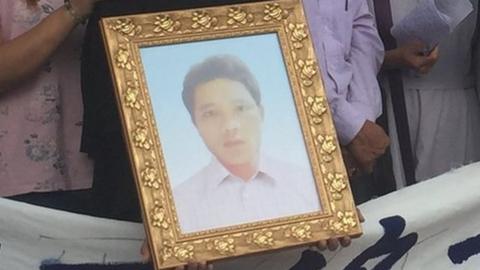 Nguyen Quoc Phi's sister and father (second and third from left) among protesters 15 September 2017