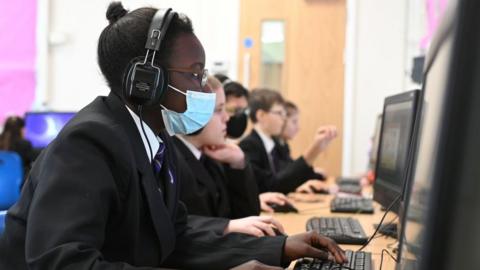 Pupil wearing a mask in school