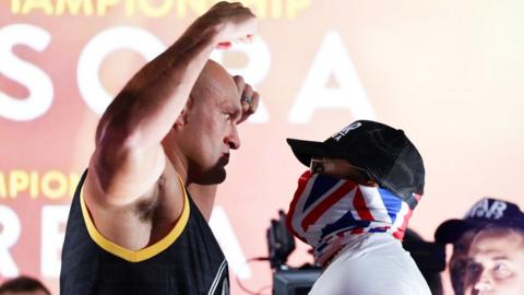 Tyson Fury and Derek Chisora face off