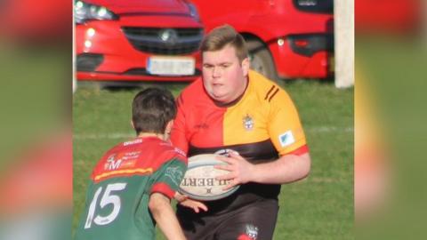 Connor Ellerton playing rugby