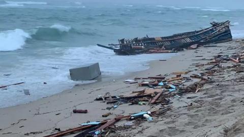 Wreckage of boat on beach