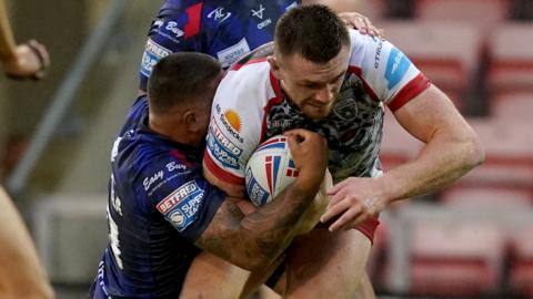 Leigh Leopards' Ed Chamberlain scores a try against Hull Kingston Rovers