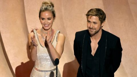 Emily Blunt and Ryan Gosling speak onstage during the 96th Annual Academy Awards