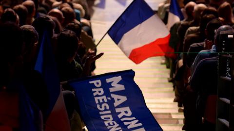 Supporters of French far-right Front National (FN) party candidate for the presidential election Marine Le Pen attend a campaign rally on March 11, 2017 i