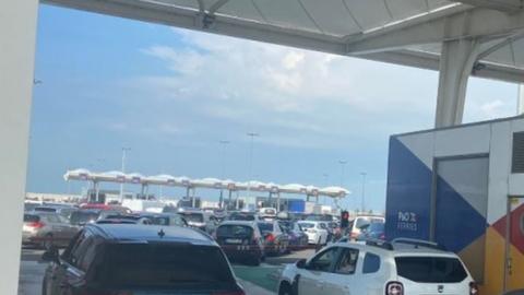 Long lines of cars form at the Port of Calais