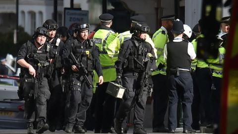 Armed police at Parsons Green station