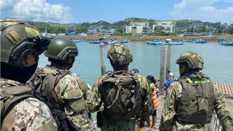 Soldiers on patrol in the port after the shooting