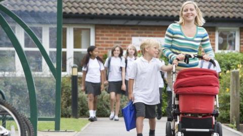 Parent and pupil outside school