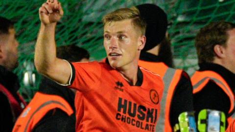 Zian Flemming celebrates scoring Millwall's winner at Plymouth Argyle