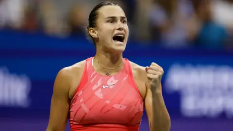 aryna sabalenka celebrates