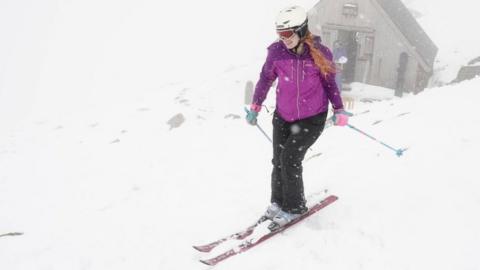 A skier makes their way down the slope at the Lake District Ski Club on Raise, next to Helvellyn in the Lake District National Park