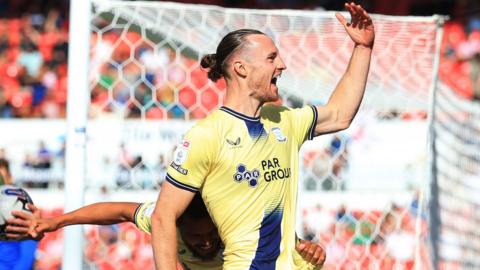 Will Keane celebrates his goal for Preston at Stoke