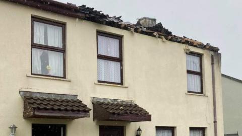 Damage to roof of house