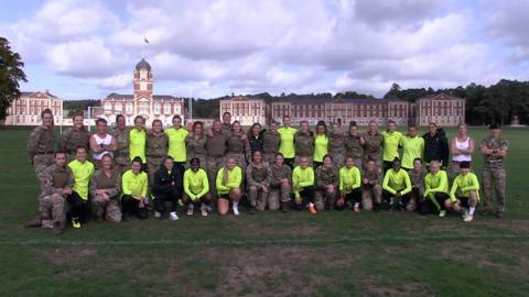 Army and footballers outside Sandhurst