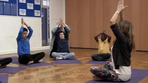 children doing yoga