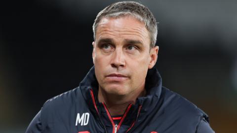 Michael Duff monitors his Swansea team