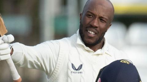 Kent captain Daniel Bell-Drummond celebrates his century against Essex