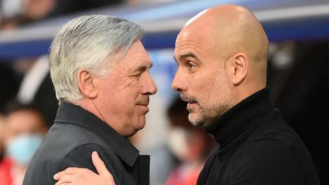 Carlo Ancelotti and Pep Guardiola greet each other in 2023