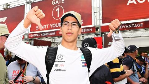 An Australian Grand Prix fans gives a thumbs-down