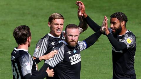 Derby celebrate Wayne Rooney's goal at Preston