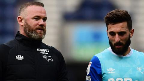 Derby boss Wayne Rooney with Graeme Shinnie