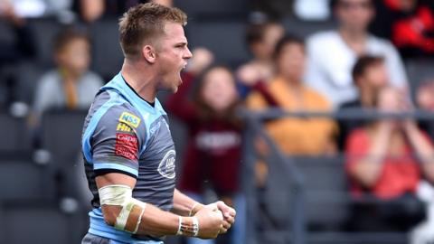 Gareth Anscombe celebrates his try against Lyon