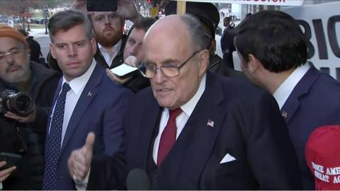 Rudy Giuliani speaking to reporters