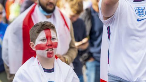 A boy supporting England