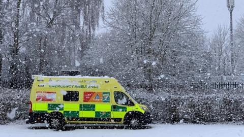 An ambulance in the snow