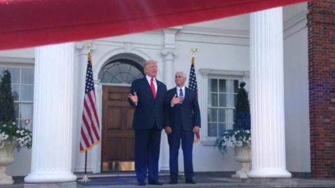 A velvet rope separates Trump from the press pool