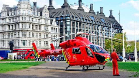 London's air ambulance landing in Parliament Square to attend an incident in 2018.