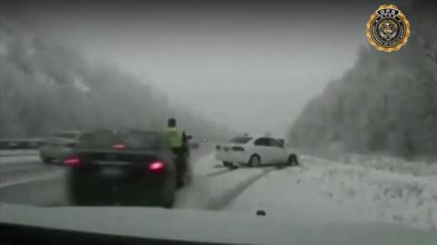 Car about to hit Utah trooper Sgt Cade Brenchley