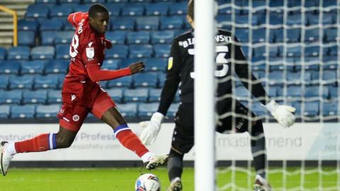 Lucas Joao's angled 53rd-minute equaliser in off keeper Bartosz Bialkowski's legs earned Reading a point at Millwall