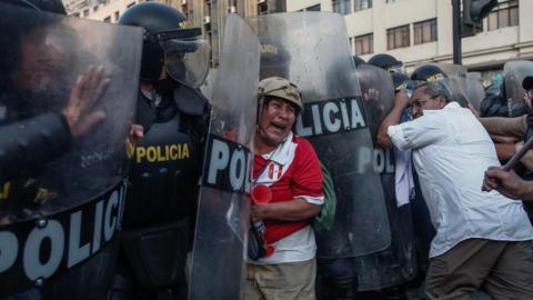 Protesters collide with police in Peru's capital, Lima
