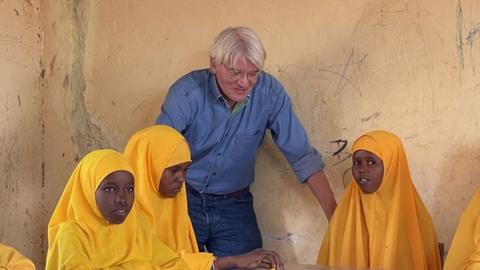 Development Minister Andrew Mitchell visiting a girls' school in Dollow, Somalia