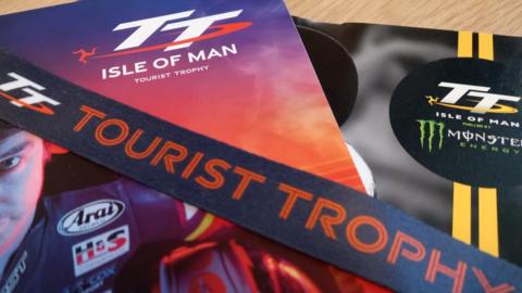 Isle of Man TT programmes and lanyard