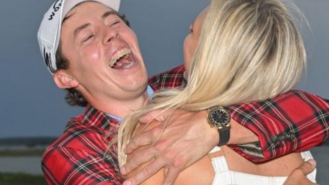 Matt Fitzpatrick hugs his girlfriend after winning the RBC Heritage PGA Tour title