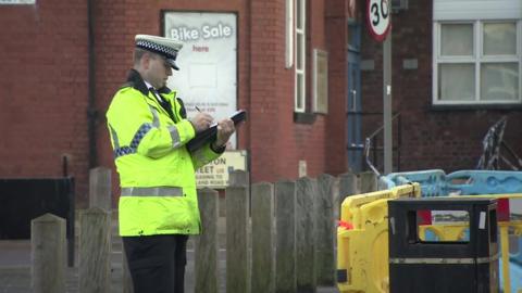 Police officer at Old Swan crash scene