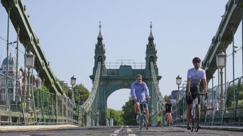 Cyclists on Hammersmith Bridge