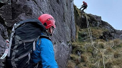 Rescuers at the scene with ropes