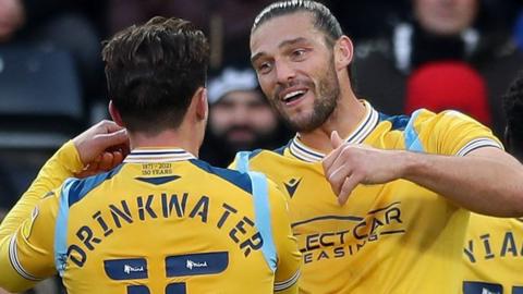 Andy Carroll celebrates scoring for Reading against Swansea