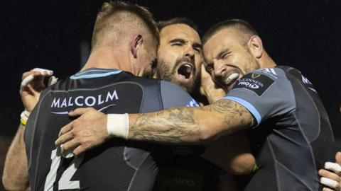 Glasgow Warirors’ Nick Frisby celebrates his try