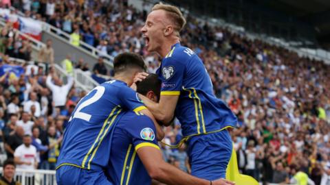 Kosovo players celebrate