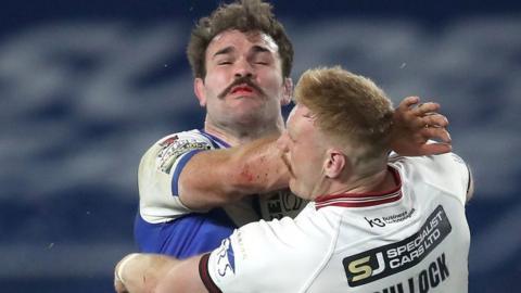 Alex Walmsley was strapped up to play a key role against Wigan in his third Grand Final triumph with St Helens
