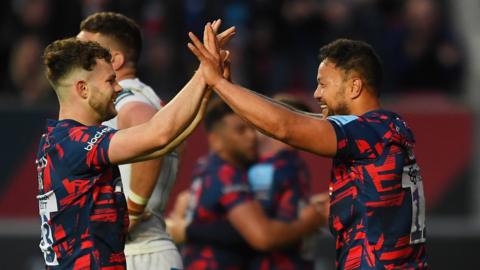 Bristol Bears celebrate scoring a try against Exeter