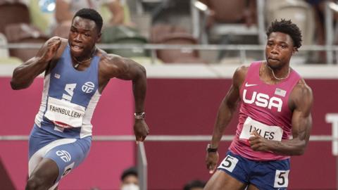 Jospeh Fahnbulleh (left) chases Noah Lyles