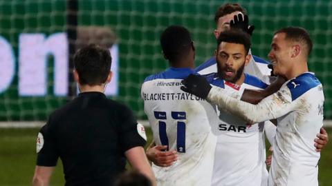 Tranmere and Kaiyne Woolery celebrate