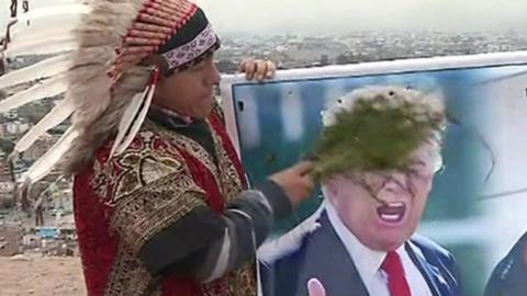 Four shamans gathered on a hill in the capital Lima to implore the countries' leaders to make peace.