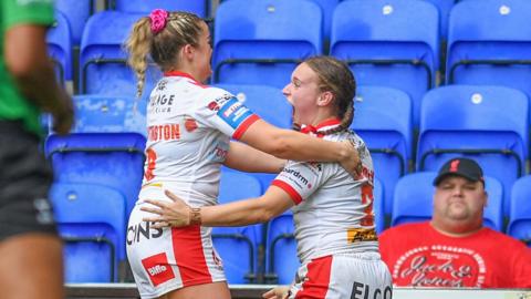 Luci McColm of St Helens WRLFC celebrates her Challenge Cup semi-final try against York Valkyrie