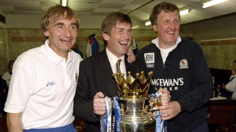 Blackburn boss Kenny Dalglish (centre) with the Premier League trophy along with coach Tony Parkes (left) and Ray Harford (right)